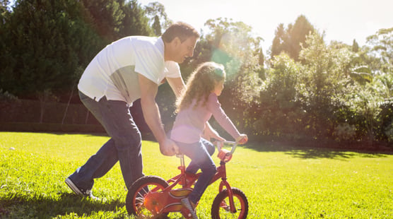 sleep-apnea-global-father-daughter-on-bicycle